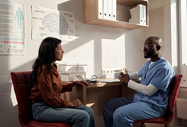 Doctor talking to patient